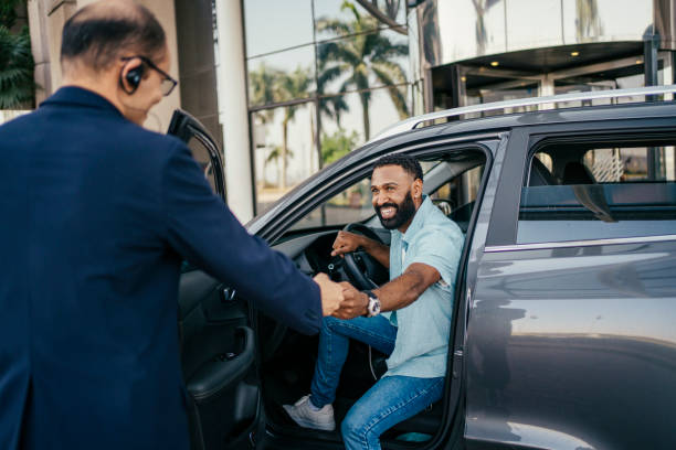 Guest arriving at hotel with car