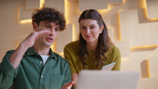istock Successful partners talking virtual conference at modern workplace closeup. 2198415636