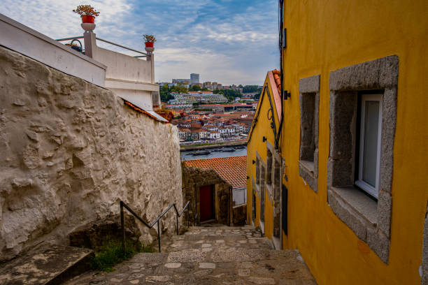 A shot of the town overlooking the river and the stone steps leading downward