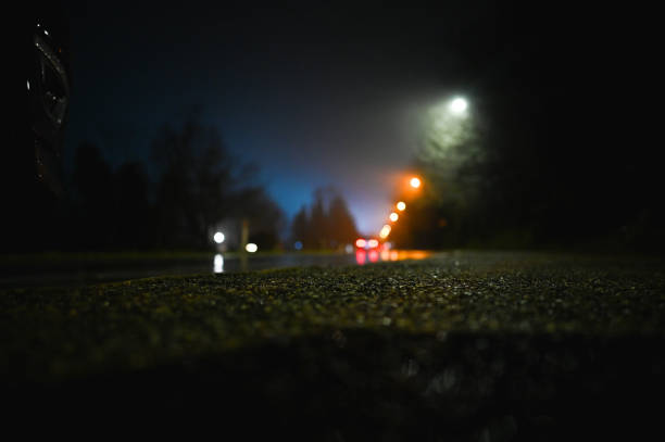 Defocused night landscape with street lights.