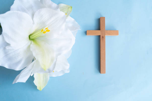 istock Simple design of an Easter cross with lilies 2198424964
