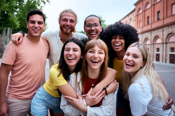 istock Happy multi-ethnic friends laughing together outdoors 2198431182