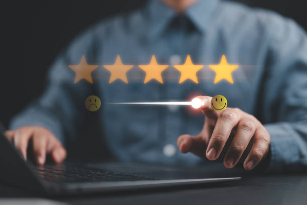 istock Customer review satisfaction feedback survey concept. Man users give rate to service experience on online application. Client positive evaluation of the quality, service, or use of product. 5 star. 2198432396