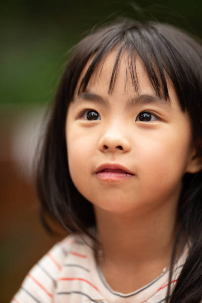 istock Cute Asian girl portrait 2198434332
