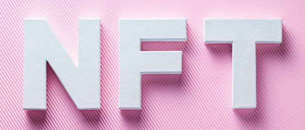 istock Non-Fungible Token on Pink Background, Top View 2198434796