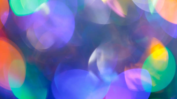 istock Vibrant Abstract Bokeh Lights with Multicolored Circles and Gradient Background 2198435805