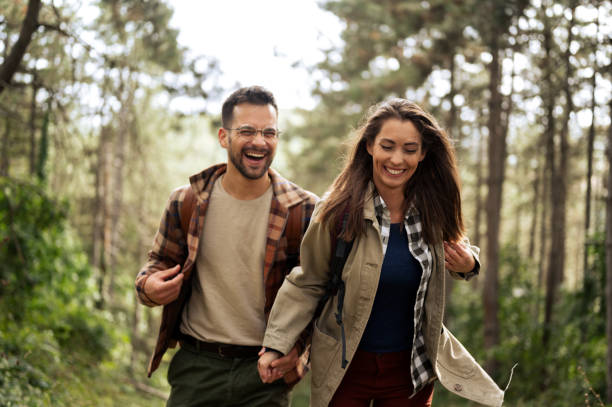 istock Beautiful young couple exploring nature 2198436637