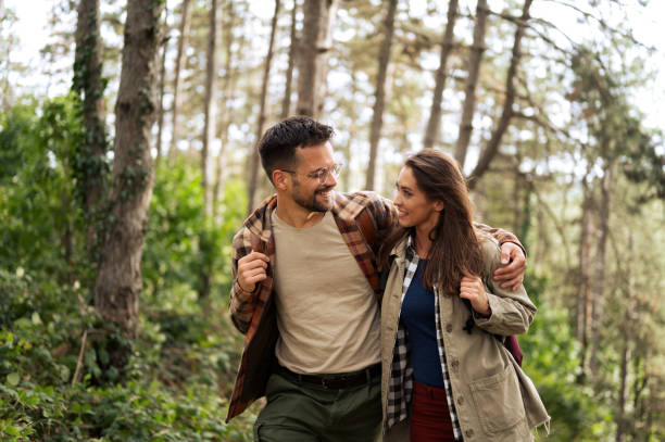 istock Beautiful young couple exploring nature 2198436685