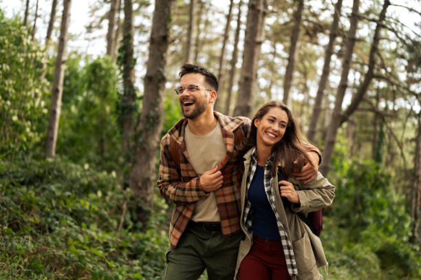 istock Beautiful young couple exploring nature 2198437133