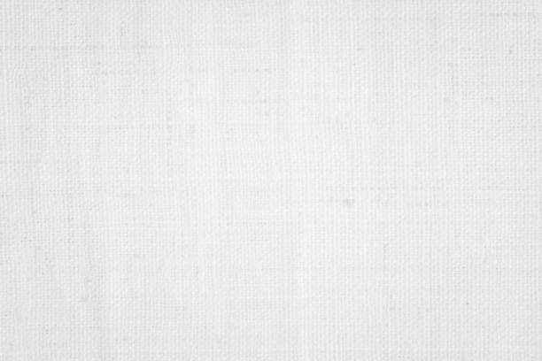 istock White color fabric canvas woven texture background in pattern light blank. Natural gauze linen, carpet wool and cotton cloth textile textured as clean empty for decoration text. Grey sack material. 2198438870