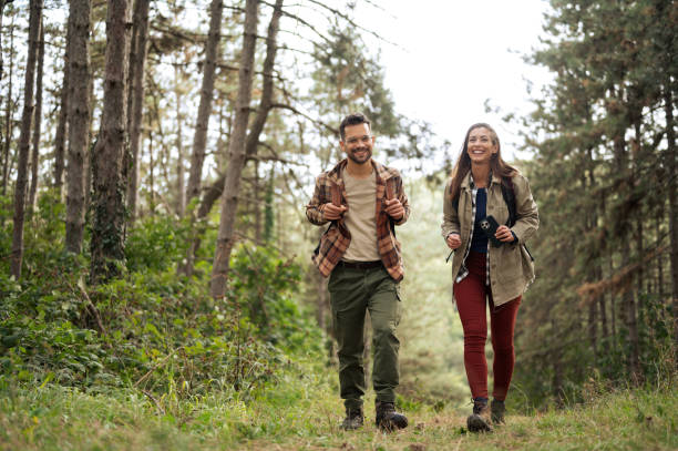 istock Beautiful young couple exploring nature 2198439894