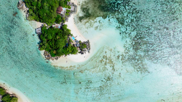 istock Sandy beach on a tropical island. Seychelles. 2198444934