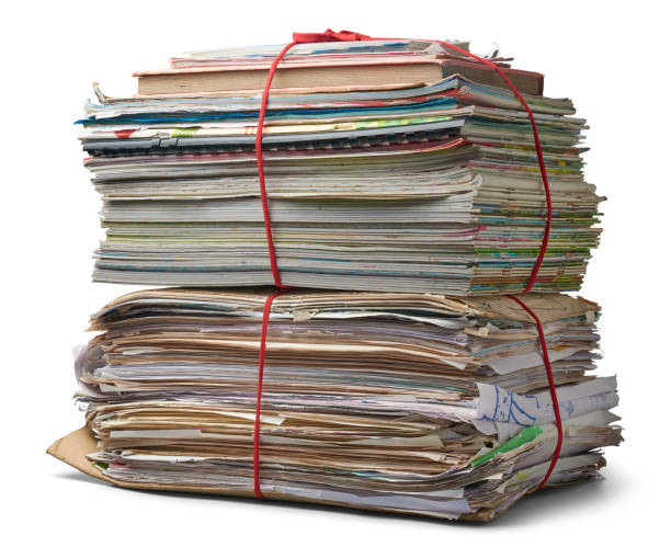stack of books, pile of old used books and papers tied together isolated white background, large collection of textbooks or notebooks, educational or academic context organization or archival concept