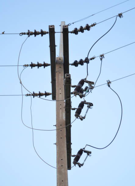 istock high voltage electric pole with wires 2198450417