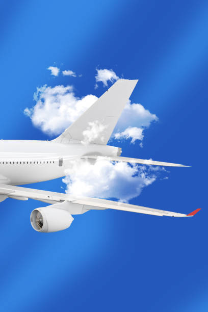 Commercial Airplane Wing Soaring Through the Clouds in Clear Sky