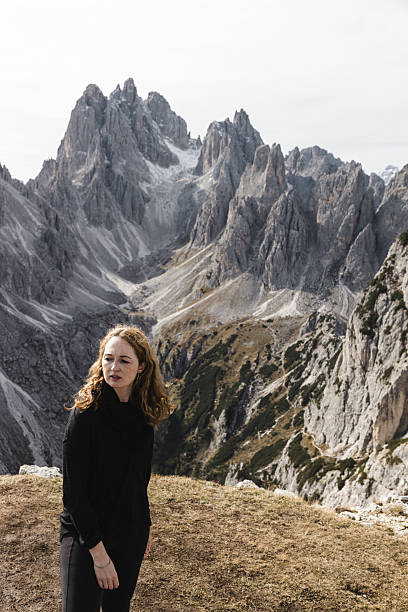 istock Woman Hiking in the Dolomites 2198454166