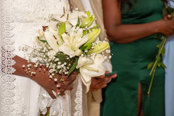 istock Beautiful Black Bride Holding Wedding Bouquet 2198458936