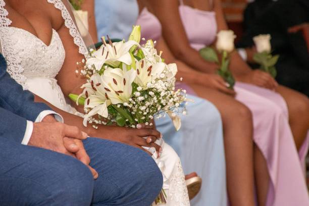 Beautiful Black Bride Holding Wedding Bouquet