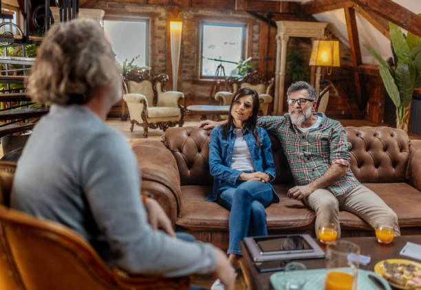 istock A group of senior friends, spending time at home, talking and having fun. 2198468290