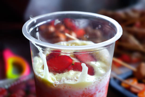 istock a glass of cold strawberry milkshake drink 2198474031