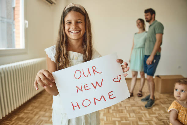 istock Family moving into new home 2198479557