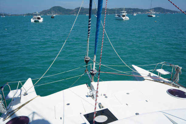istock A white voyage boat featuring a steering wheel floating in the water 2198480906