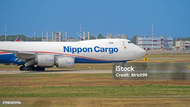 Nca Nippon Cargo Airlines Boeing 747 Is Taxiing At Mxp Milano Malpensa International Airport Stock Photo - Download Image Now