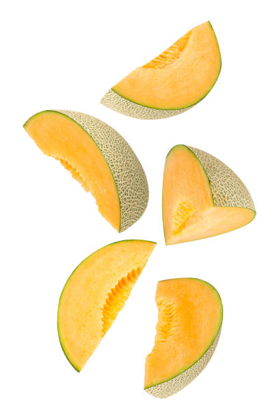 istock Falling Cantaloupe Melon isolated on white background with clipping path, full depth of field 2198484352