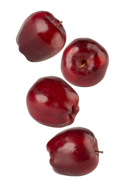 istock Falling Red Apple isolated on white background with clipping path, full depth of field 2198484438
