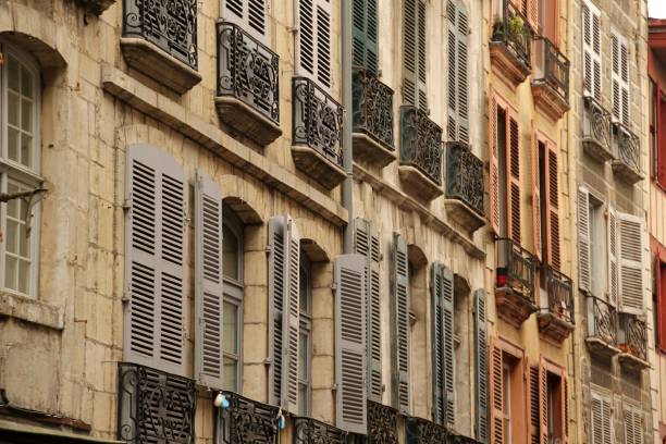 istock Charming European building facades with colorful shutters. 2198485088