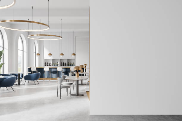 istock Modern minimalist cafe interior with green table and wooden stools. 3D Rendering 2198487477