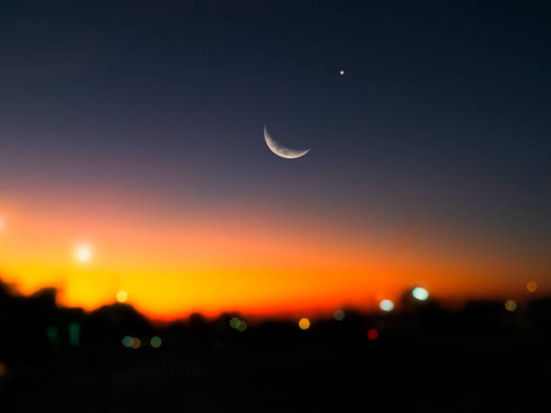 istock Moon sky ramadan with bokeh city background 2198488433