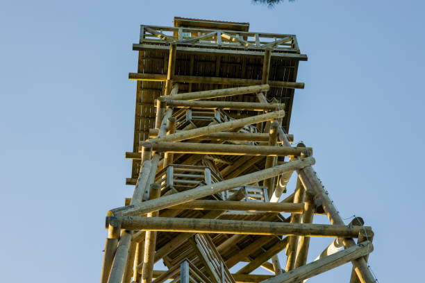 istock Wooden observation tower against a clear blue sky. 2198488682