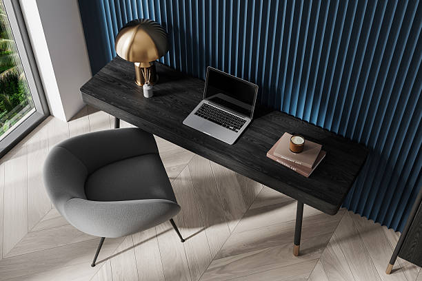 istock Modern home office desk setup with grey chair and laptop. 3D Rendering 2198489677