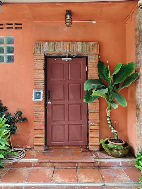 istock Retro wood door closed in brick frame. 2198490152
