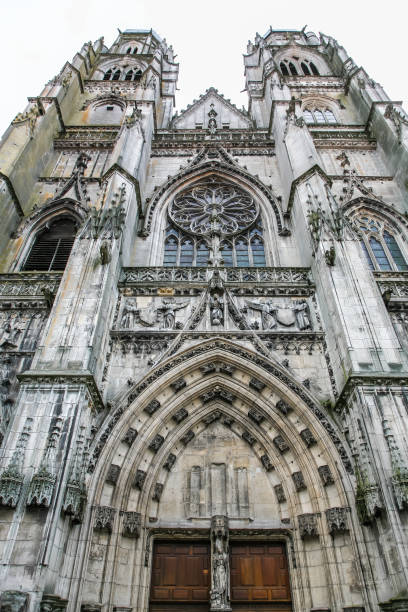 istock A large church with a tall steeple and a large window 2198491959