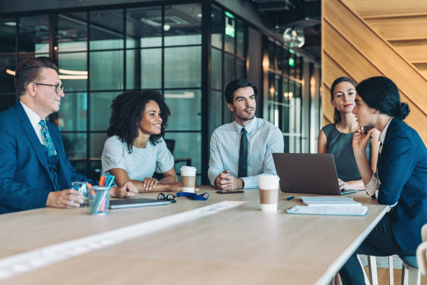 istock Group of entrepreneurs working together 2198493812