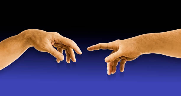 istock Two hands touching with fingers Michelangelo the creation of Adam 2198493961