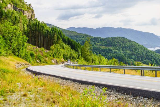 istock Road landscape in norwegian mountains 2198502992