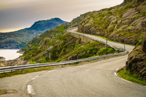 istock Road winding in mountains Norway 2198503024