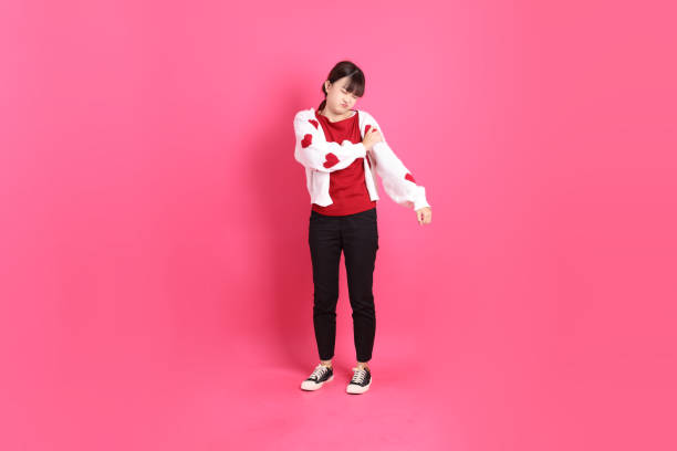istock 20s woman in red t-shirt 2198504821