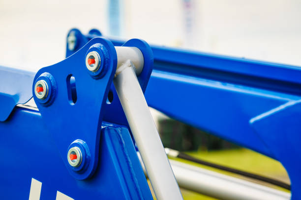 Hydraulic mechanism on modern machine. Industrial detail piston in machinery. Technology.