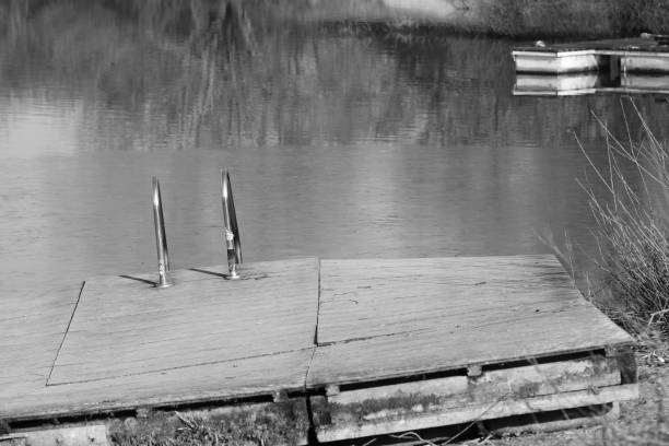 Swimming platform on riverbank in winter
