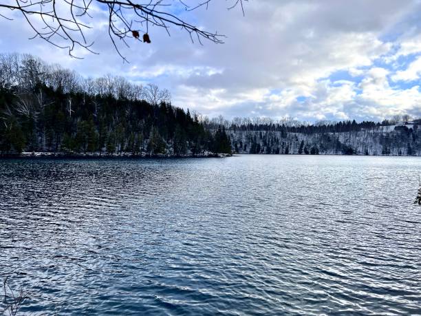istock Beautiful lake scene in winter 2198509496