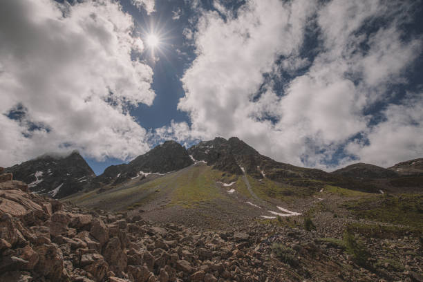 Landscape of Swiss Alps in Engadin on a cloudy day.
