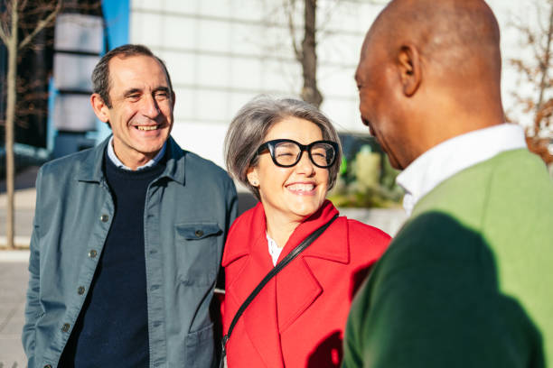 istock Three senior friends sharing a joyful moment outdoors 2198511773