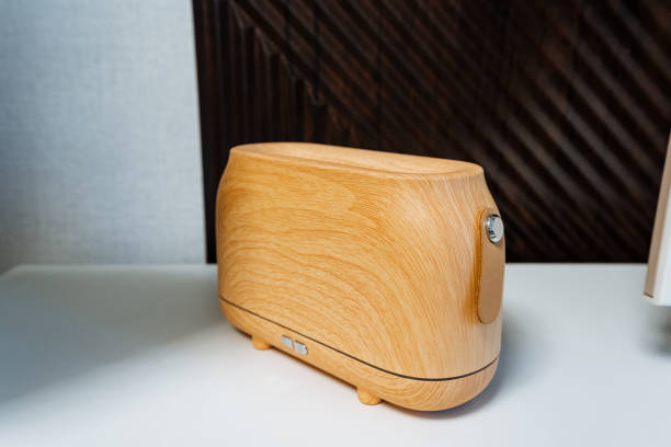 istock A rustic wooden toaster is elegantly placed on a clean, white table, showcasing its craftsmanship and design, surrounded by various materials and inspirations such as wood and leather 2198512371