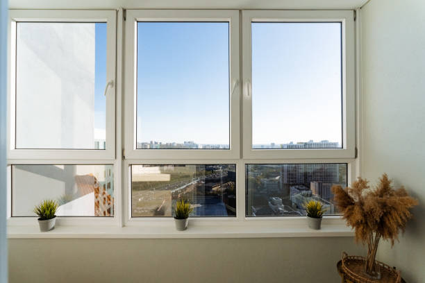 istock The spacious room has large windows that bring in natural light and is beautifully decorated with vibrant potted plants on the windowsill, enhancing the overall ambiance 2198512410