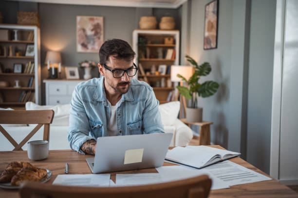 Man working hard in his home office