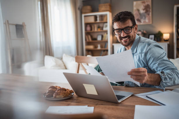 istock Determined man achieving goals from his home office 2198514569